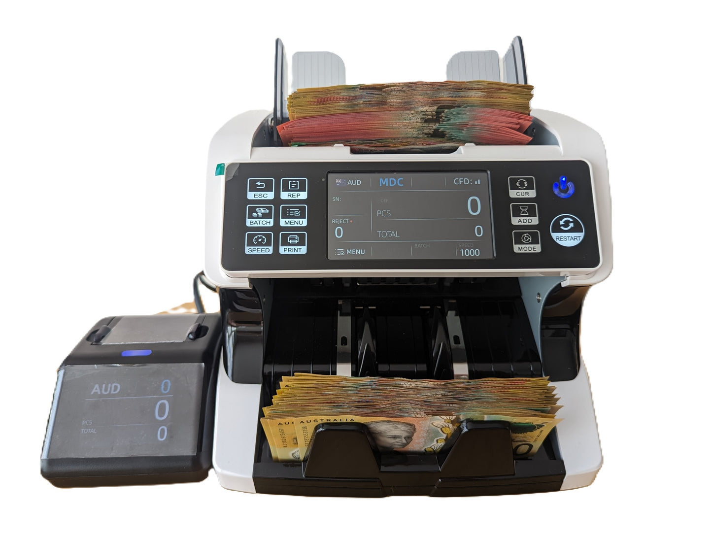 A money counting machine with Australian dollar bills being processed. The machine has a touchscreen interface and various buttons for operation.